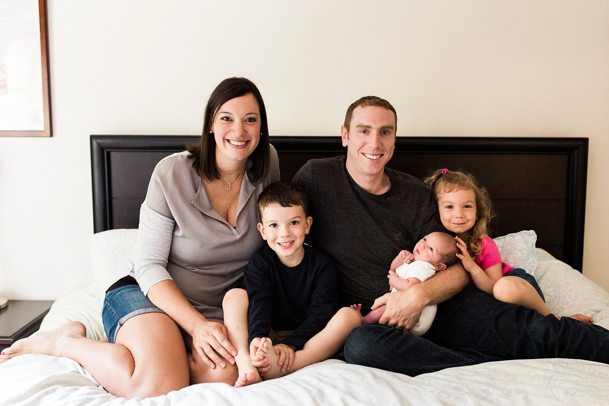 newborn with family in home photos