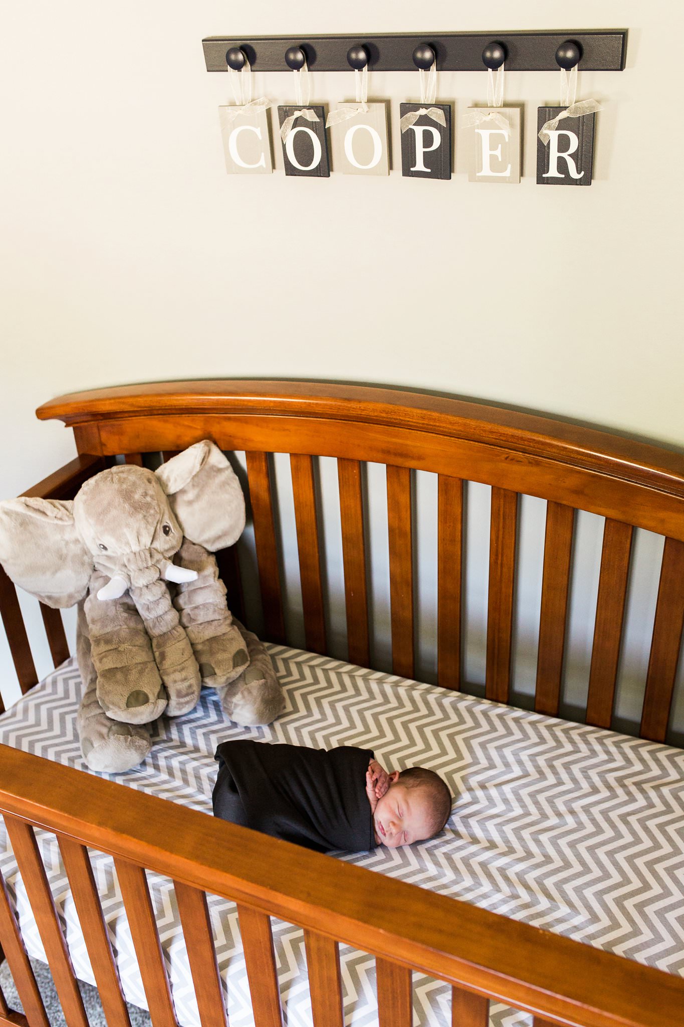 photo of newborn baby in crib