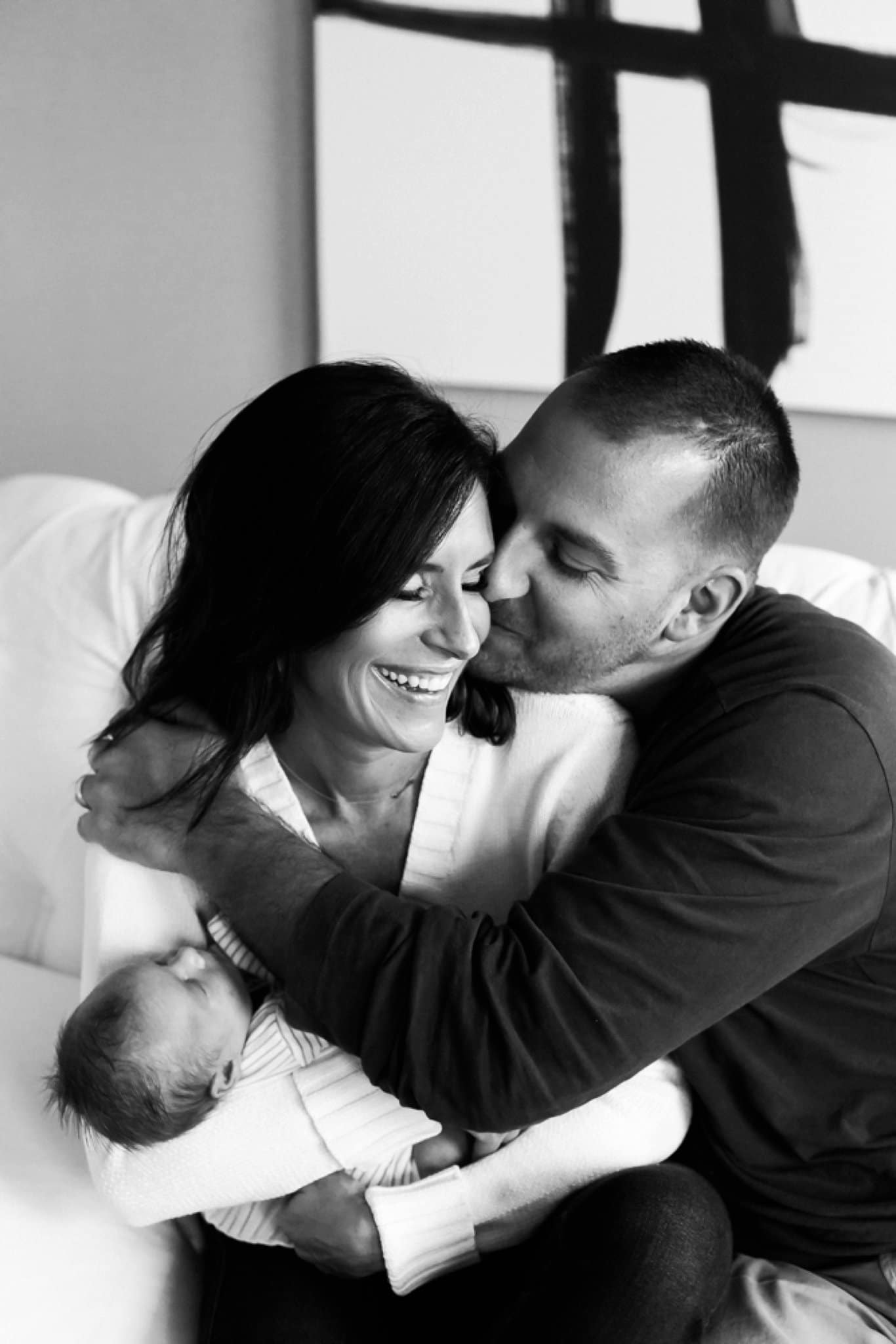 photo of parents and newborn at home in pittsburgh pa