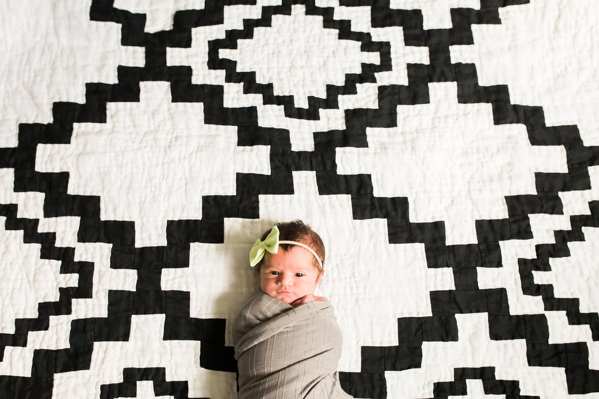 Newborn on graphic print blanket