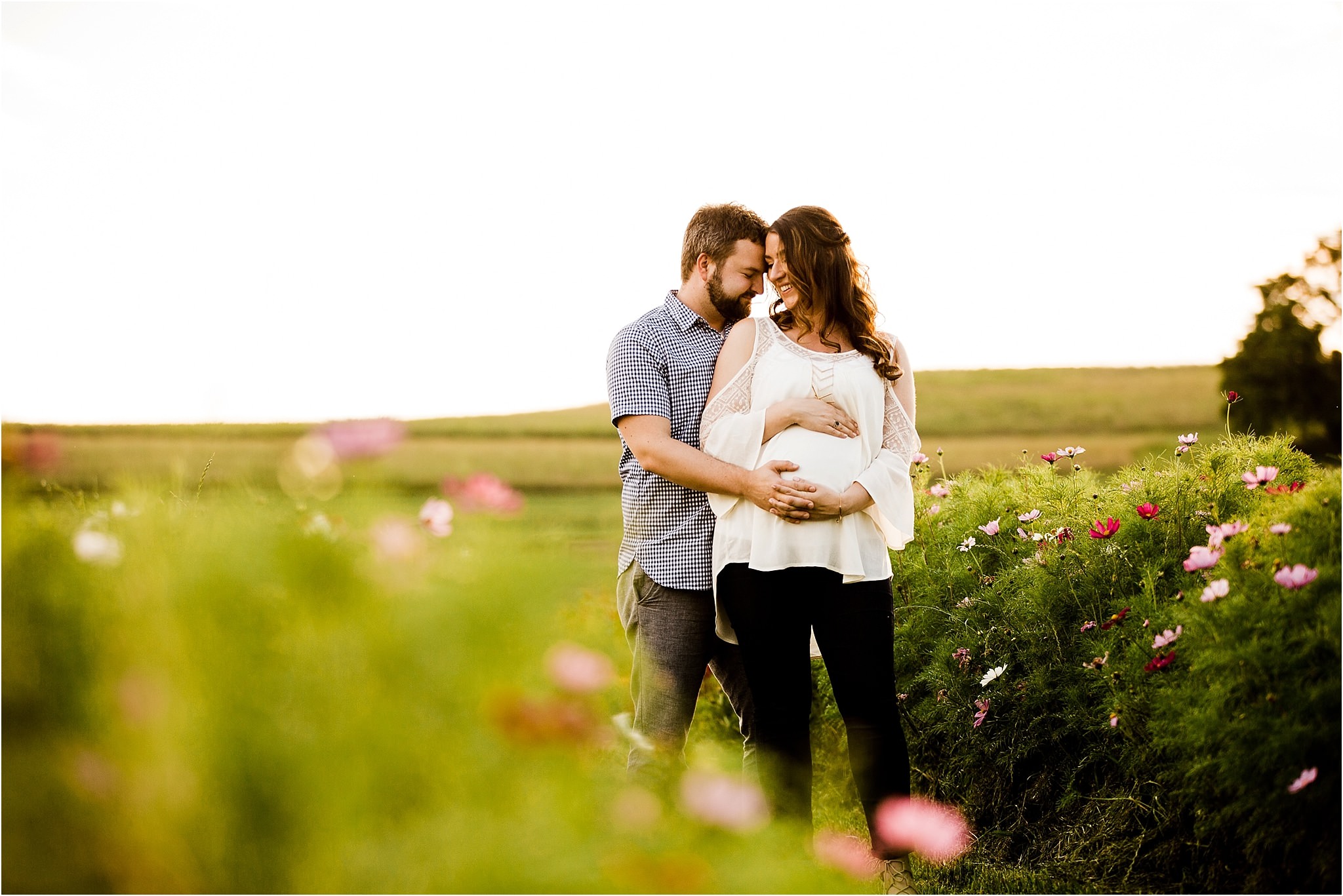 photo of expecting mother and father at Simmons Farm