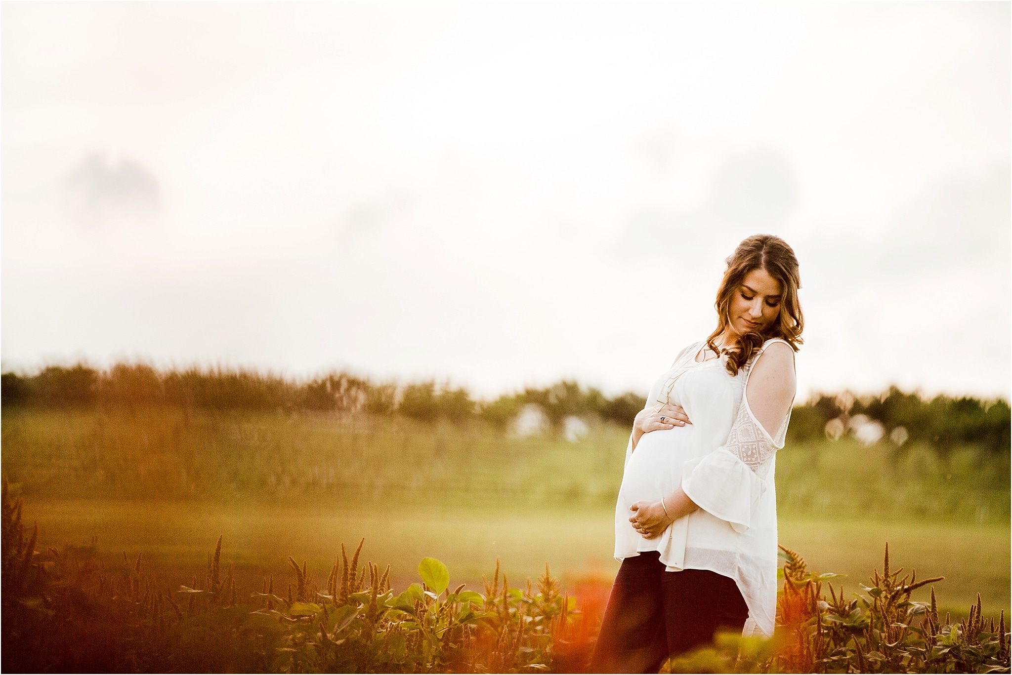 Maternity photos in flower field at Simmons Farm