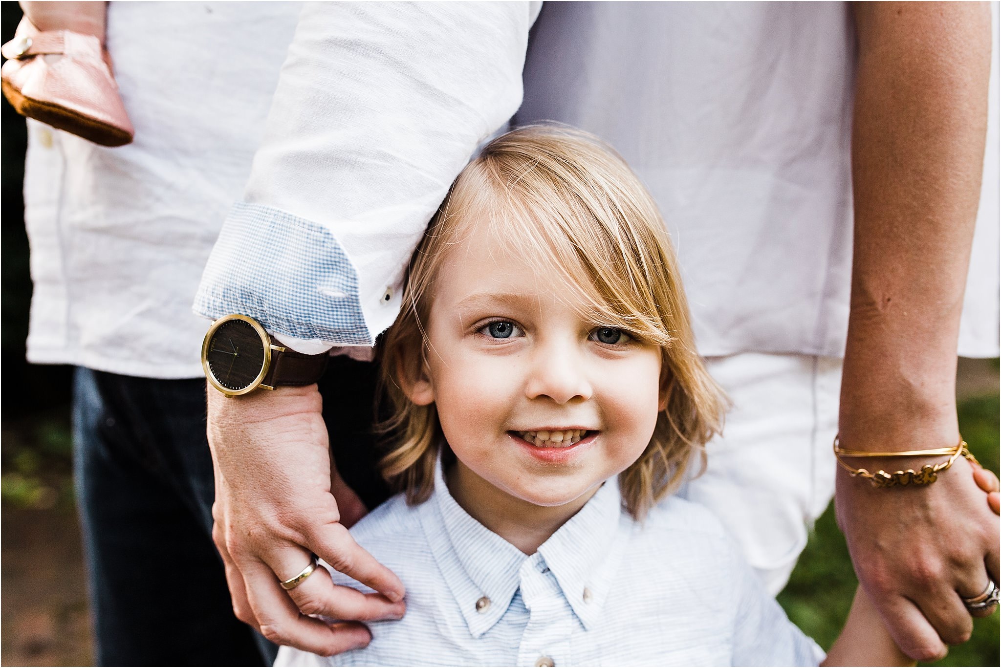 close up photo of young boy at family photo session