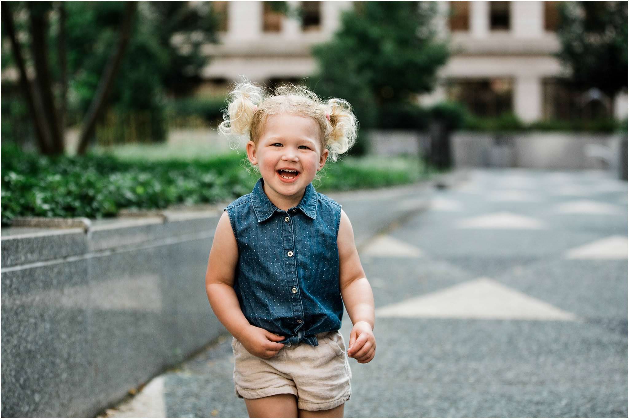 toddler girl smiling downtown pittsburgh