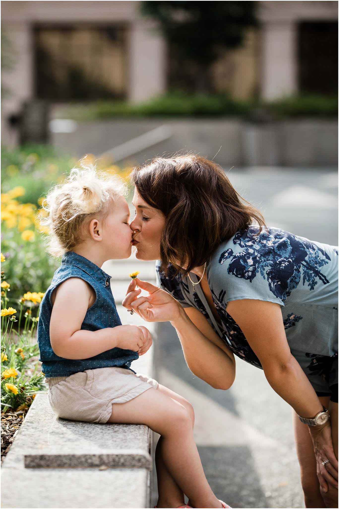 mother daughter kiss