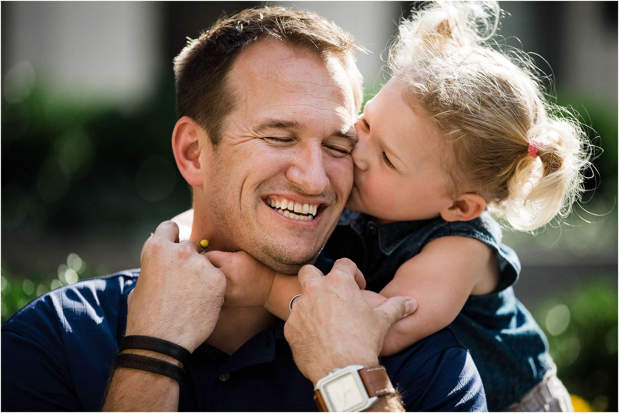 daughter hugging father at downtown Pittsburgh family session