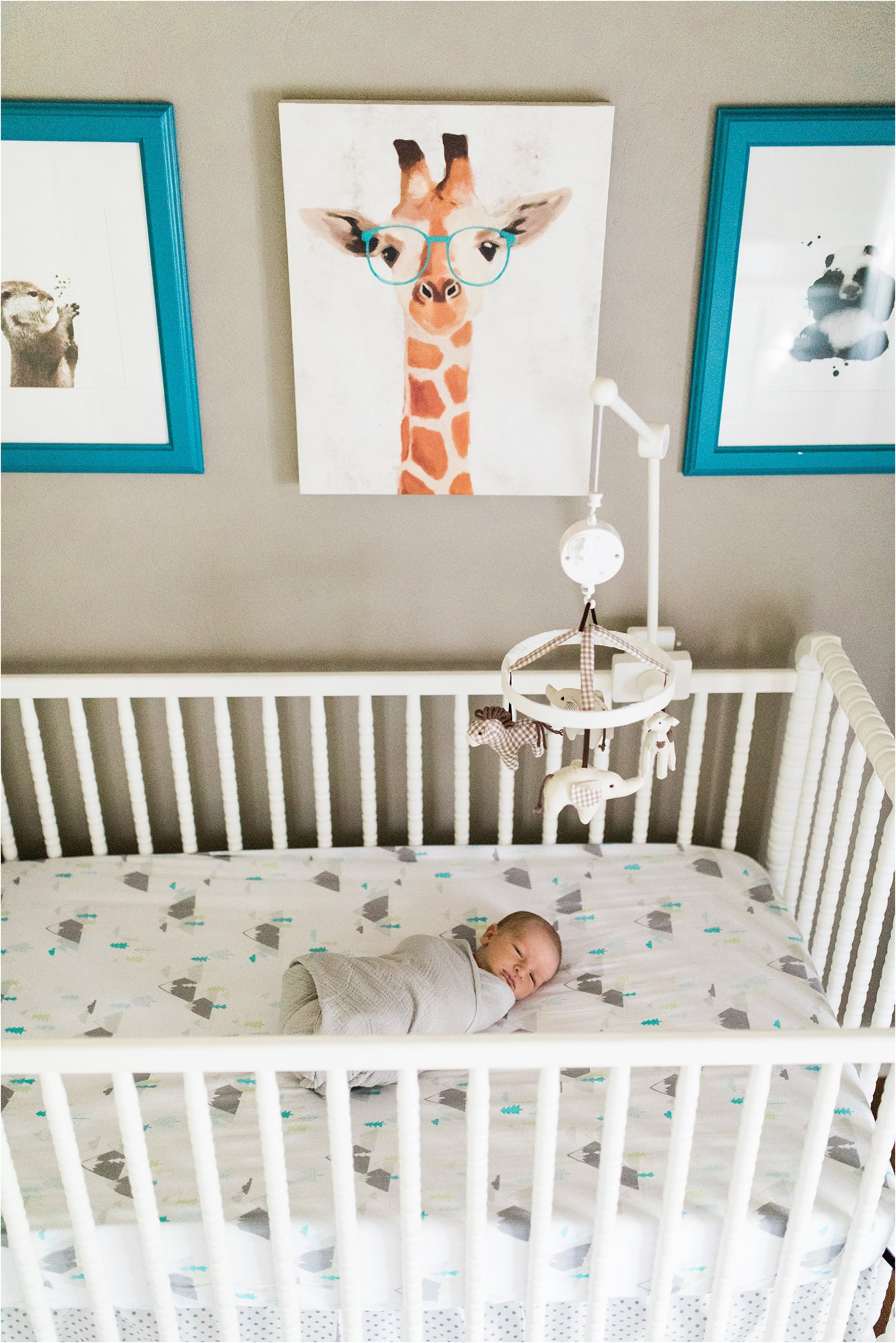 newborn sleeping in crib