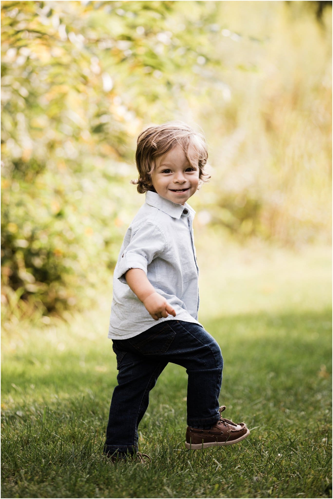 Young boy poses for a picture isolated on white Stock Photo by ©natkin  9467139