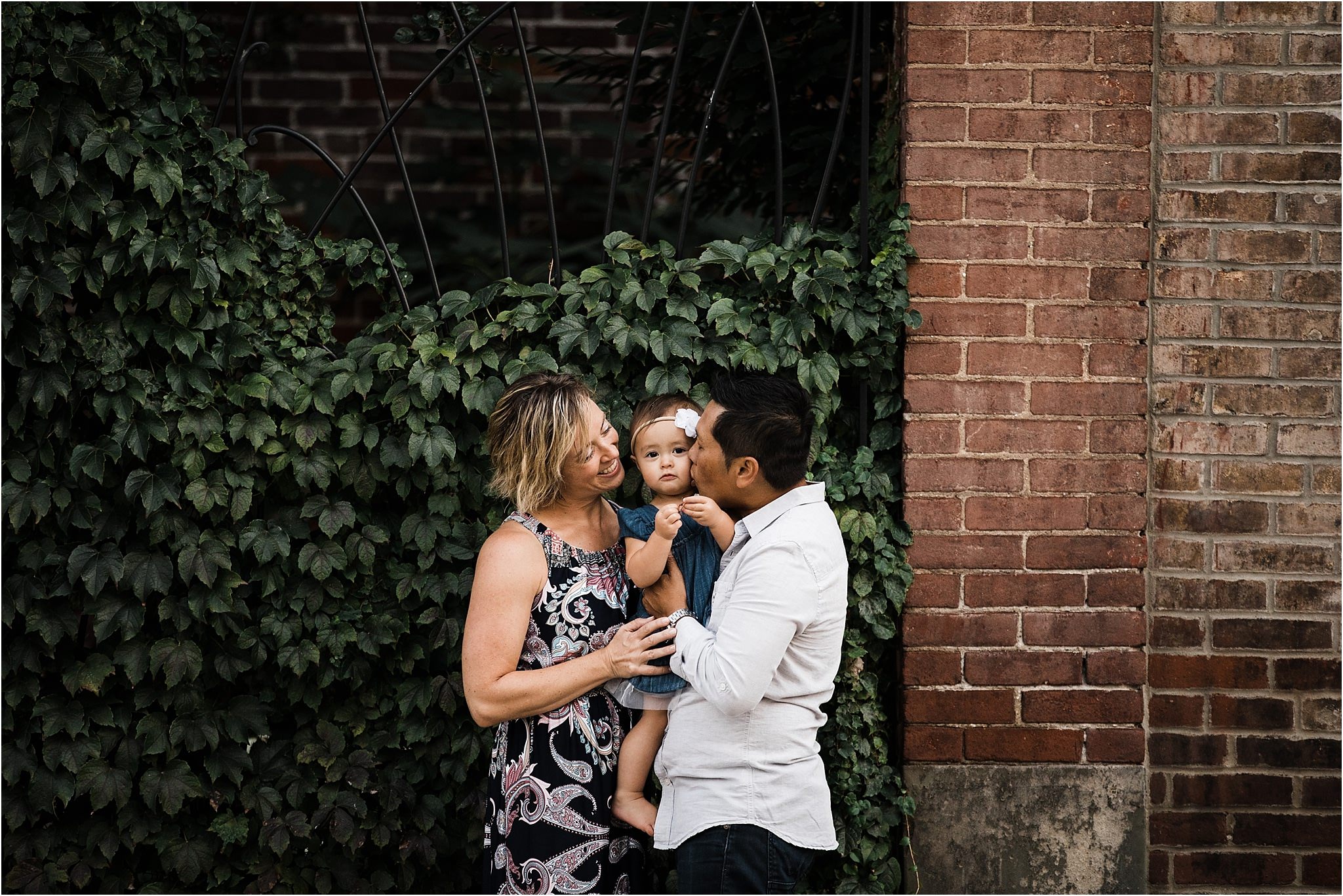 family photo in front of home in pittsburgh lawrenceville 