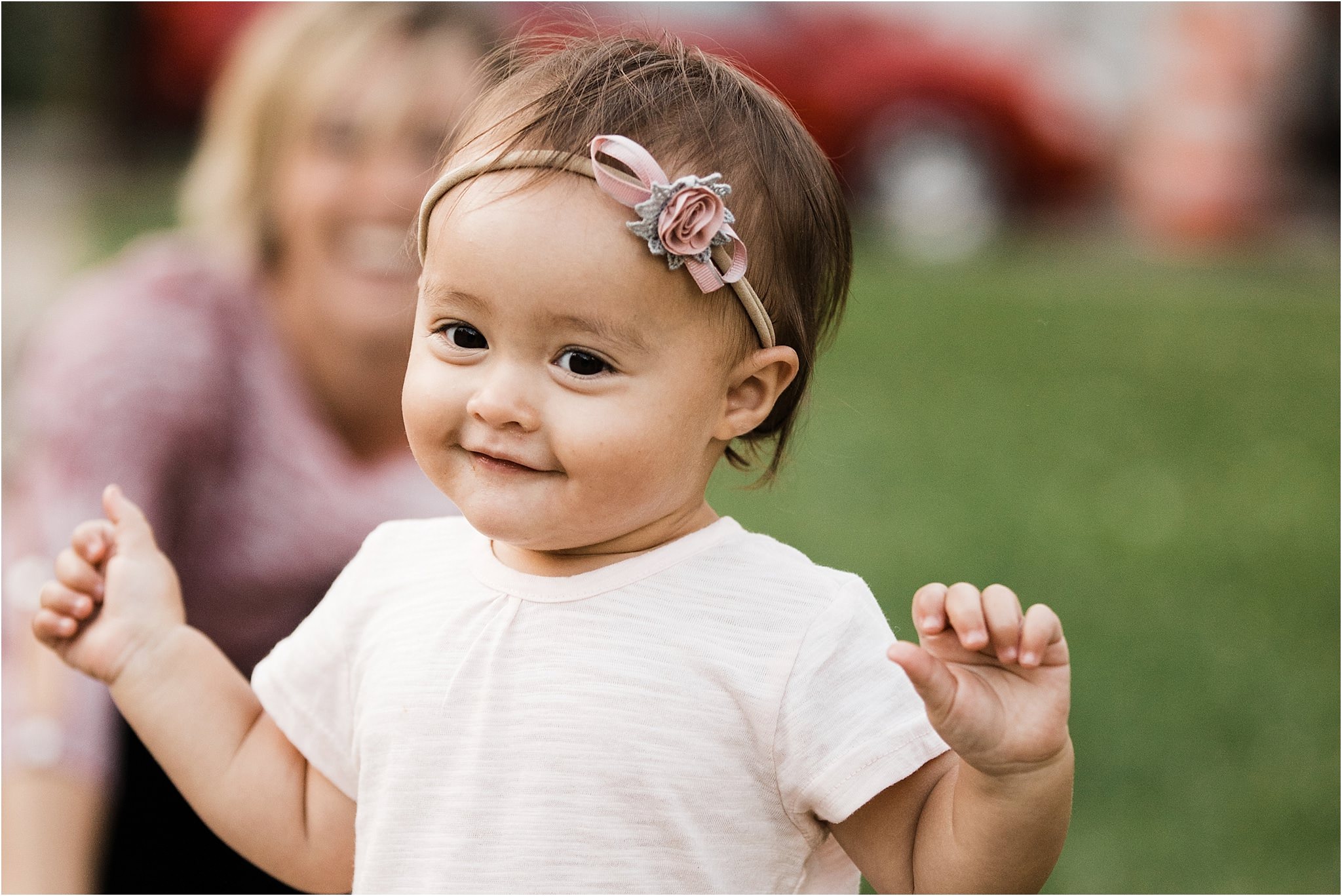 one year old daughter walking away from mother