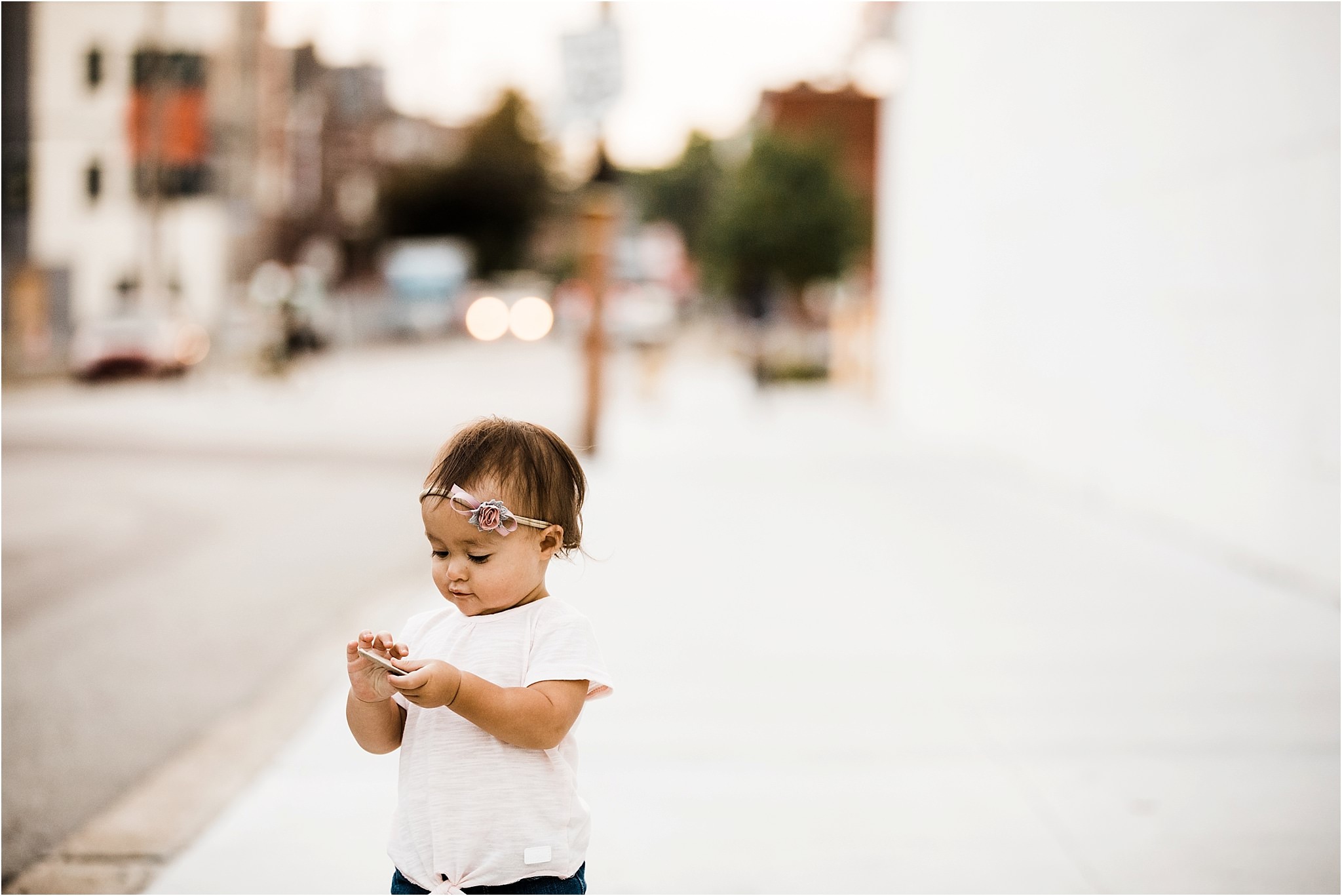 baby girl walking city sidewalks in lawrenceville pittsburgh