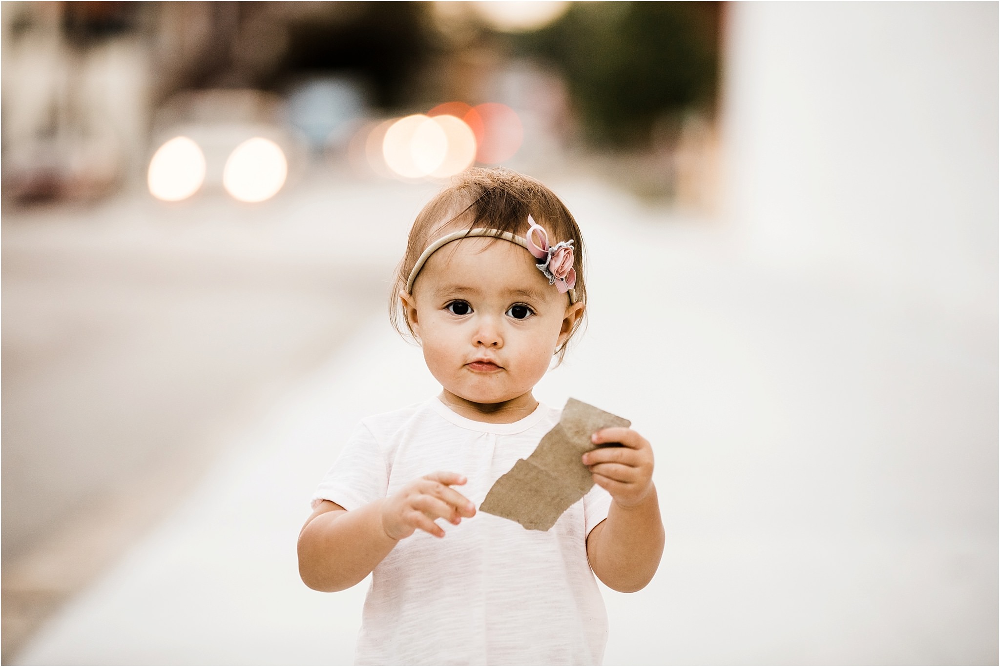 baby girl walking city sidewalks in lawrenceville pittsburgh