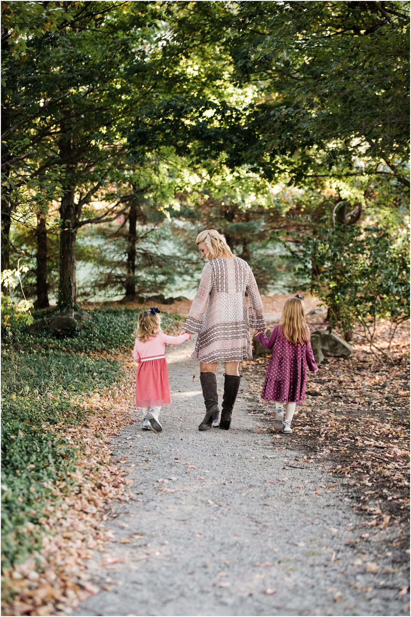 Mother walking with daughters