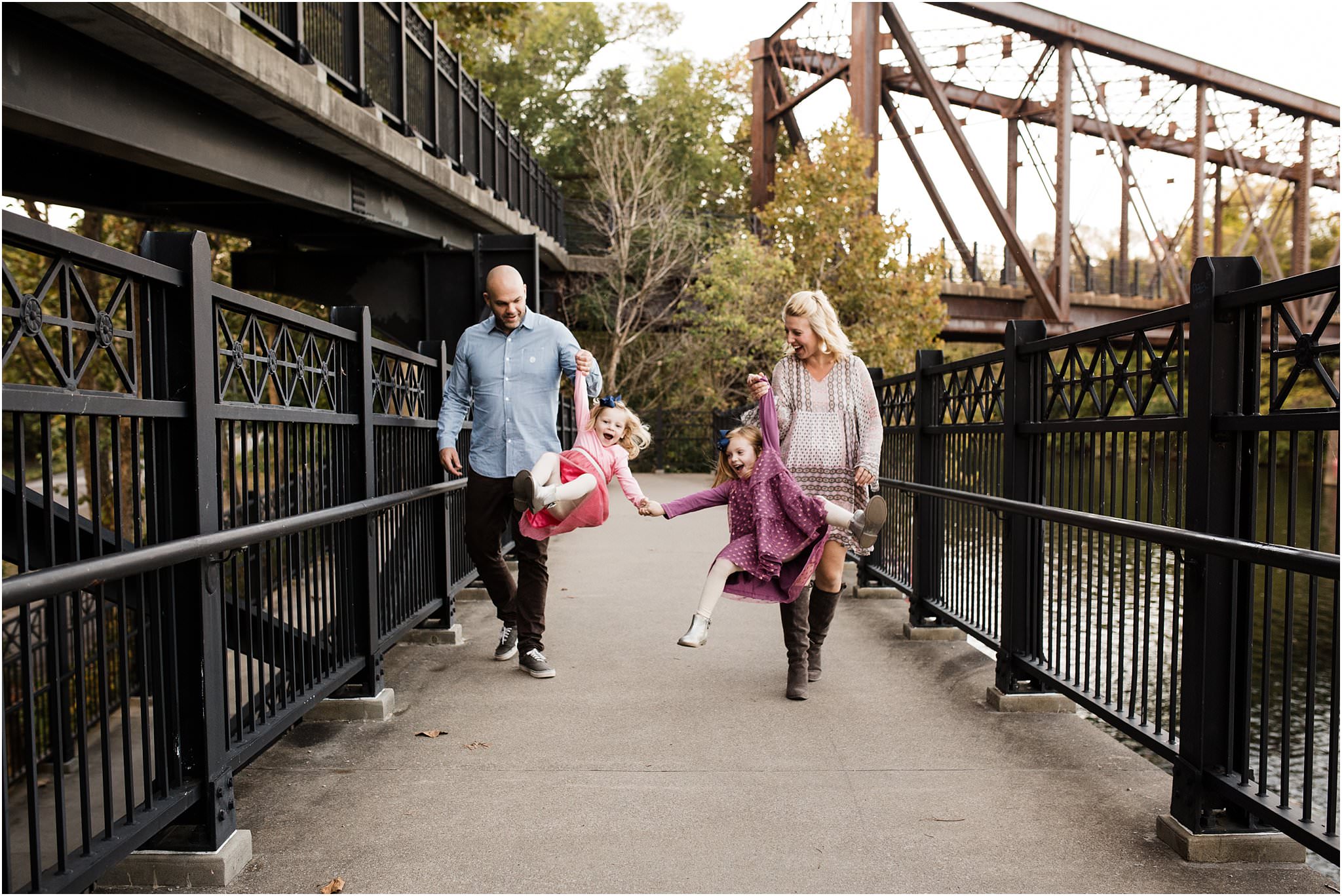 family waling on bridge at Washington's Landing