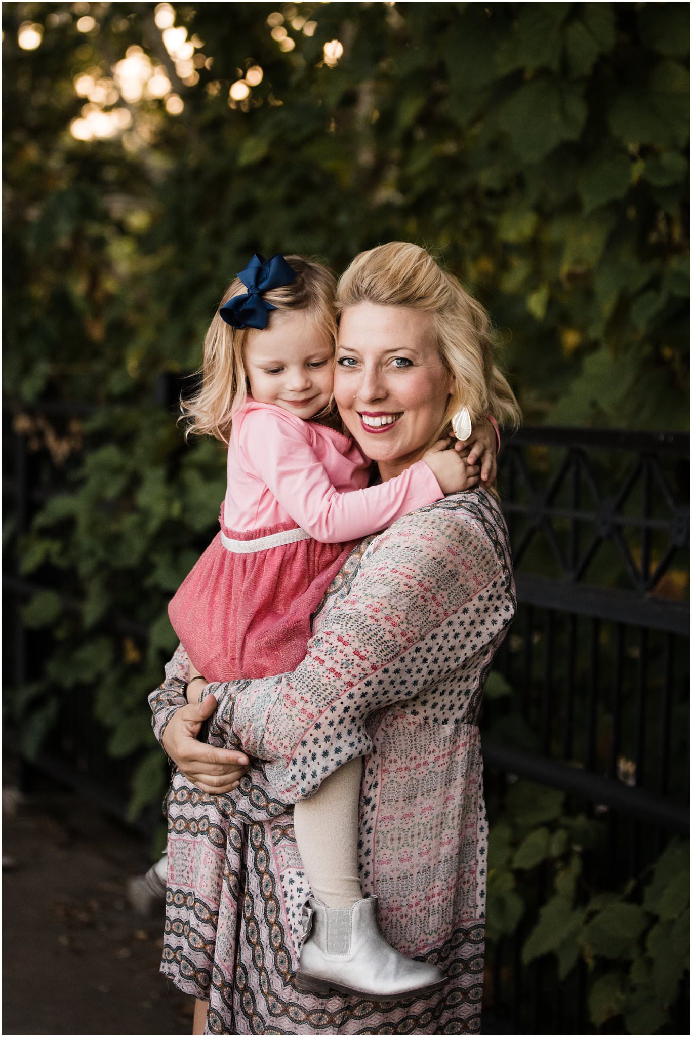 mother holding daughter