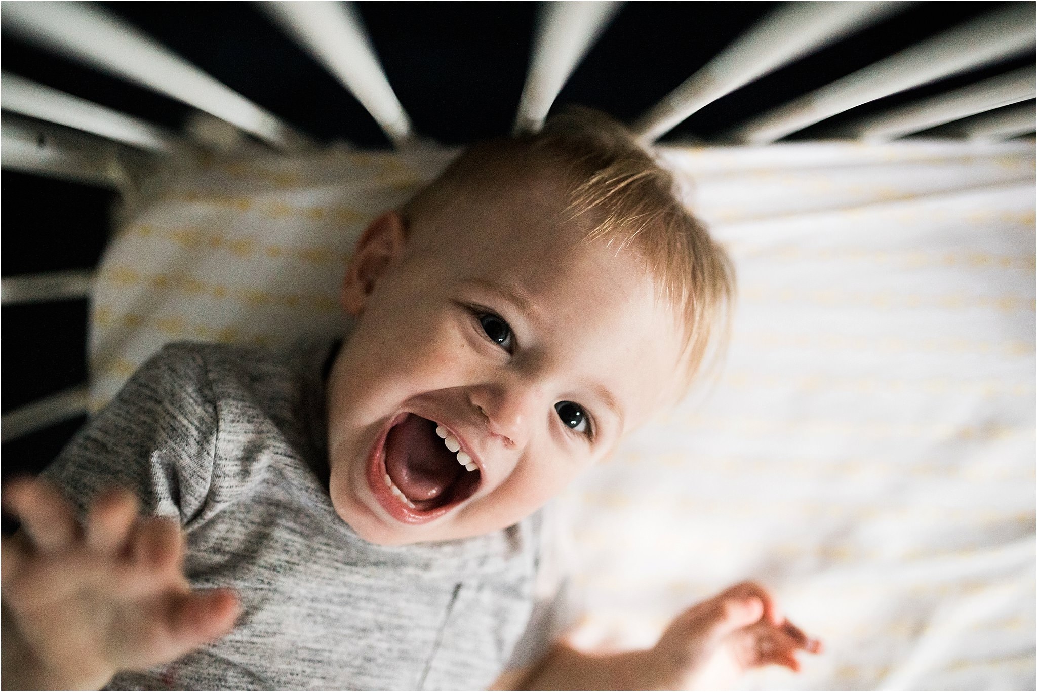 one year old boy in crib