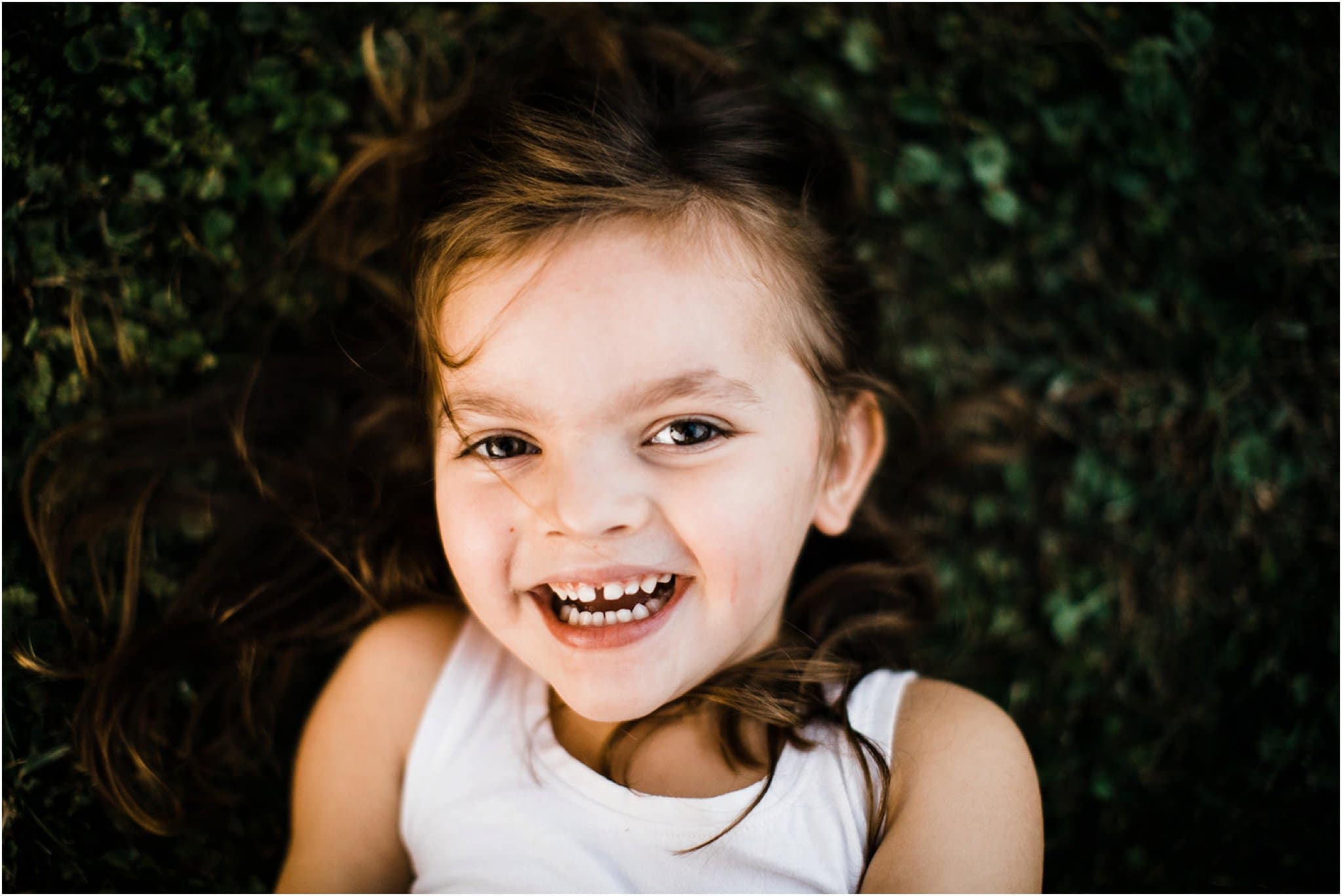 toddler photo in grass at golden hour