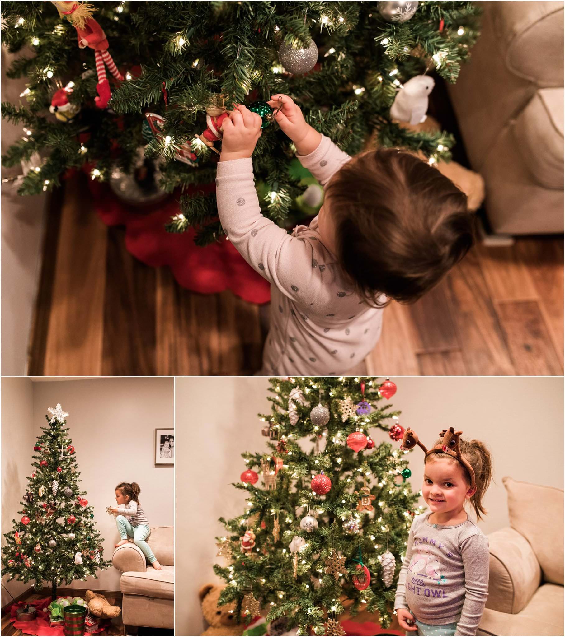 toddlers decorating the family Christmas tree
