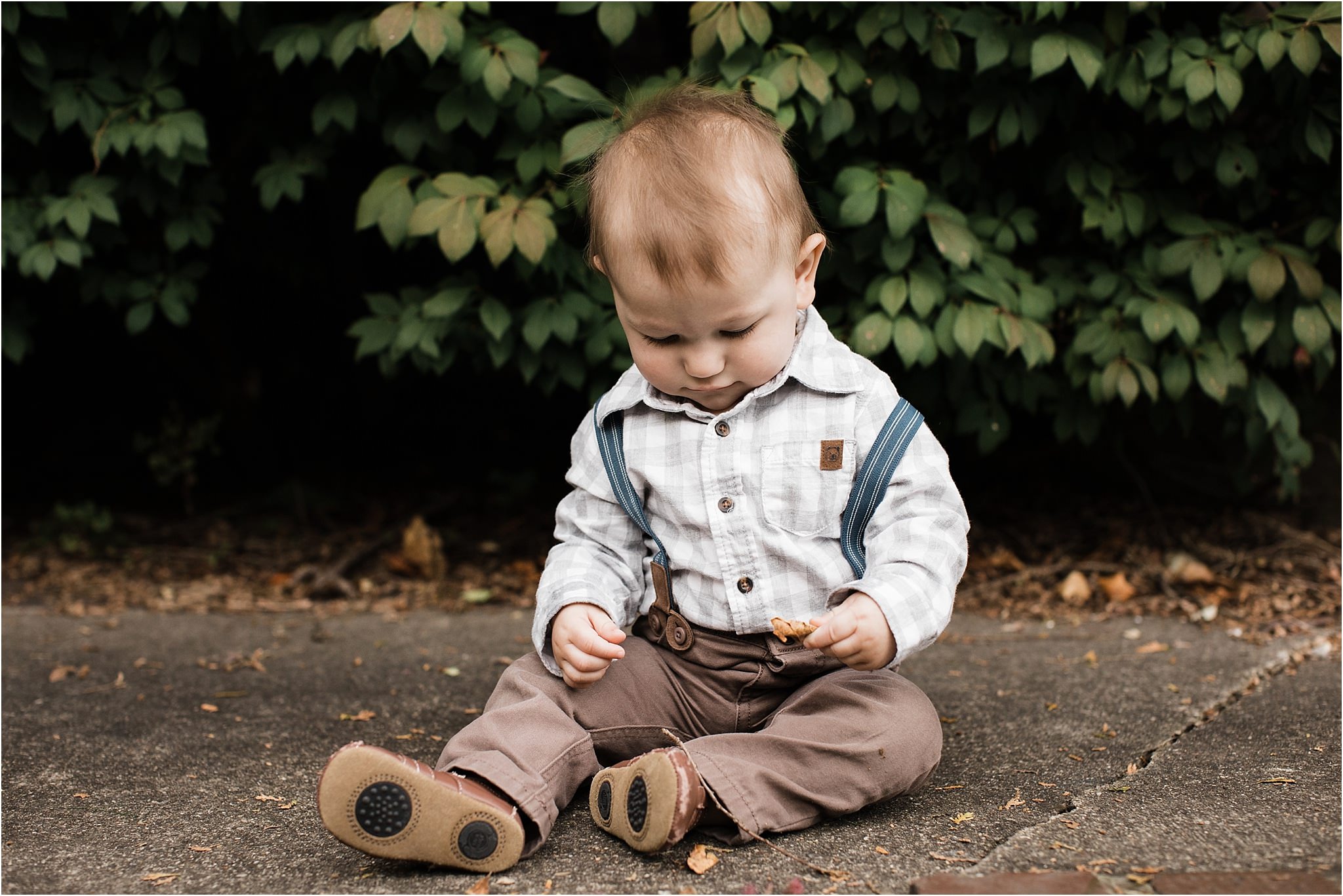 baby in suspender and checkered plaid shirt