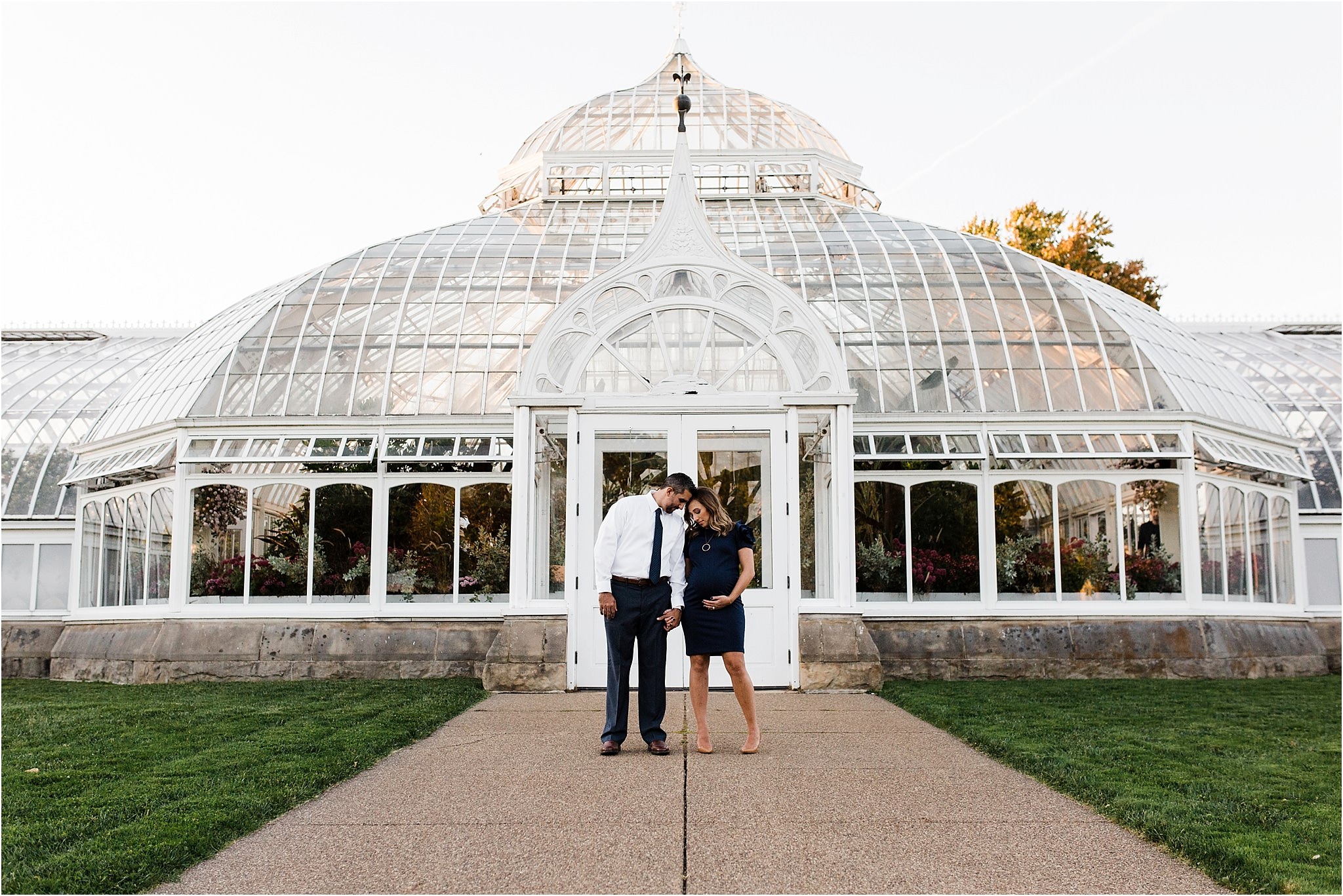Couples golden hour maternity photos outside Phipps Conservatory Pittsburgh