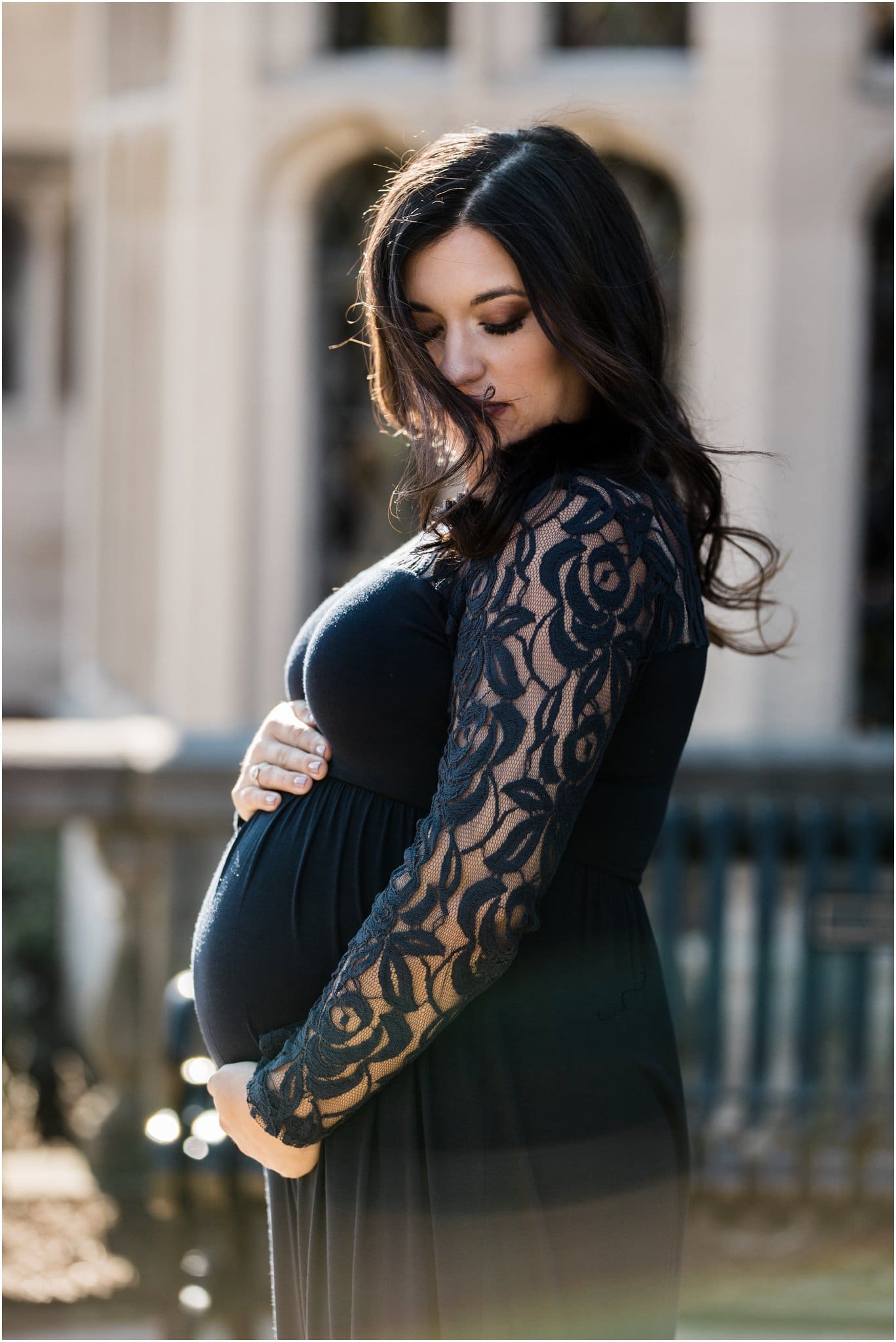 beautiful expecting mother in blue lace maternity dress