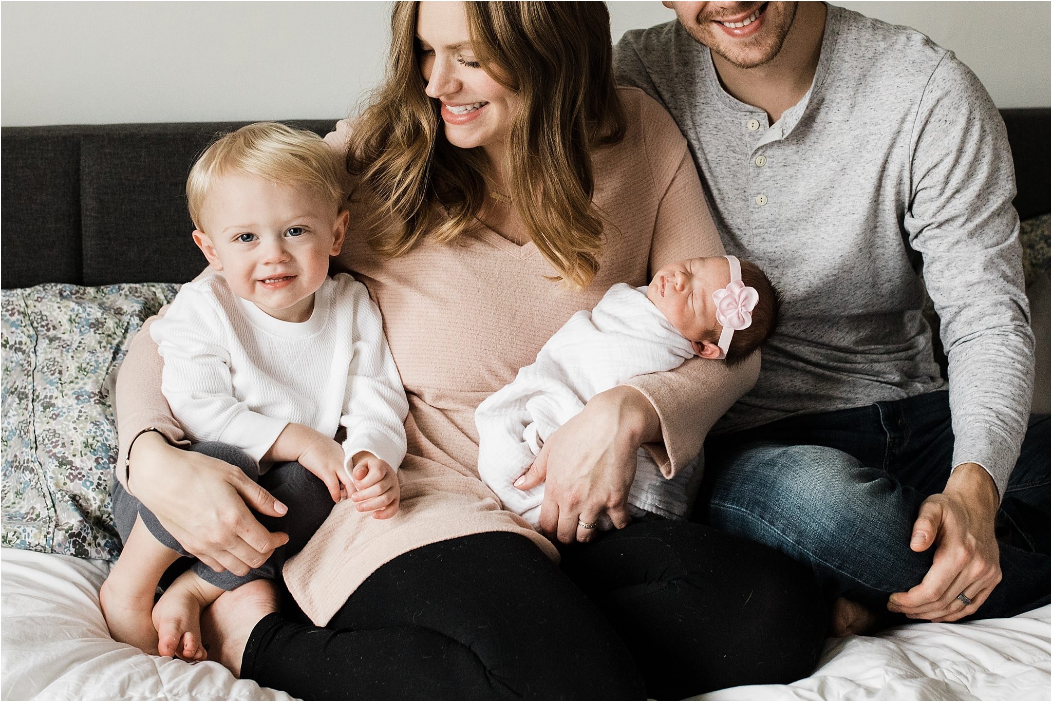 family photos in bedroom at newborn session at home