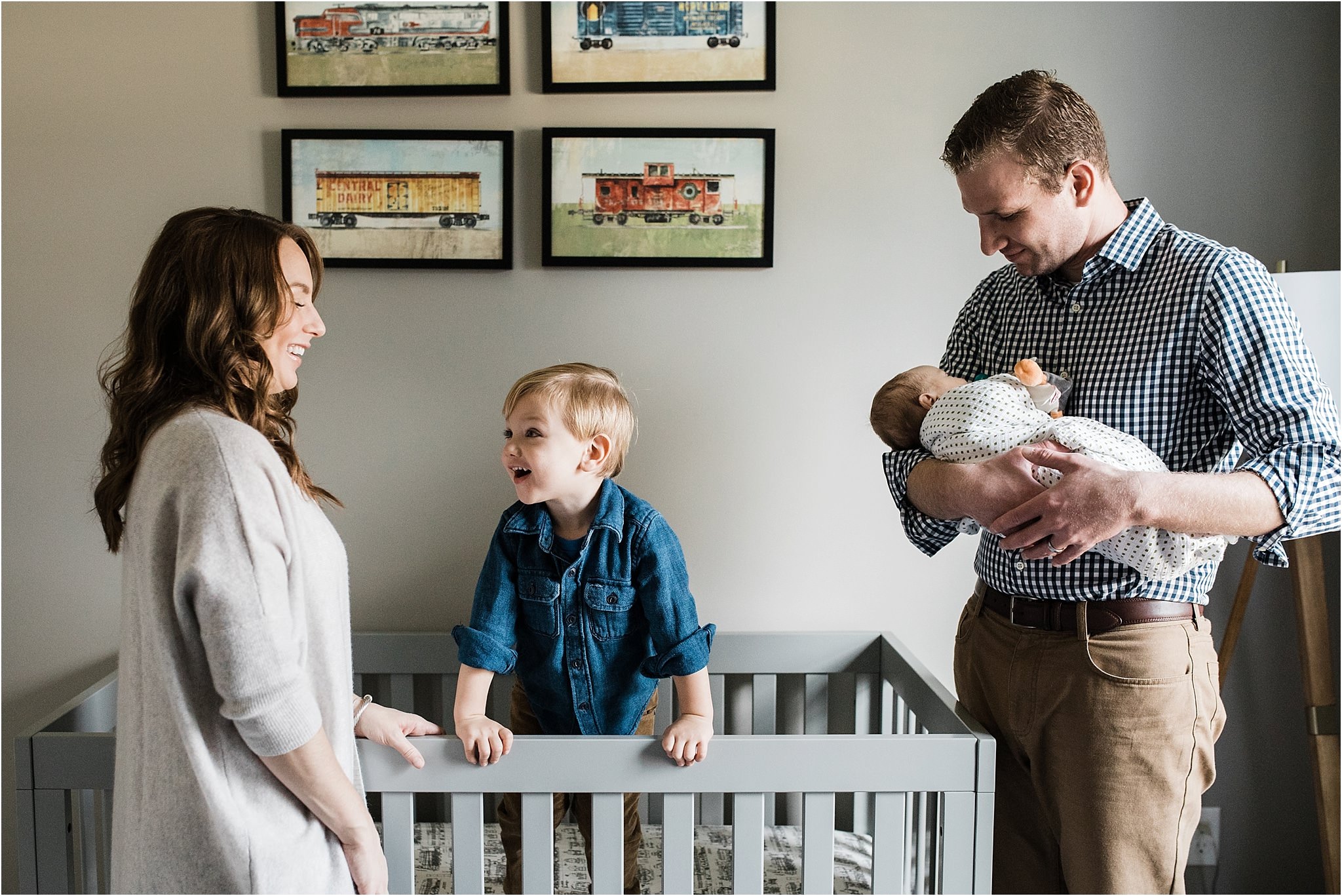 natural family photos in nursery during home newborn session