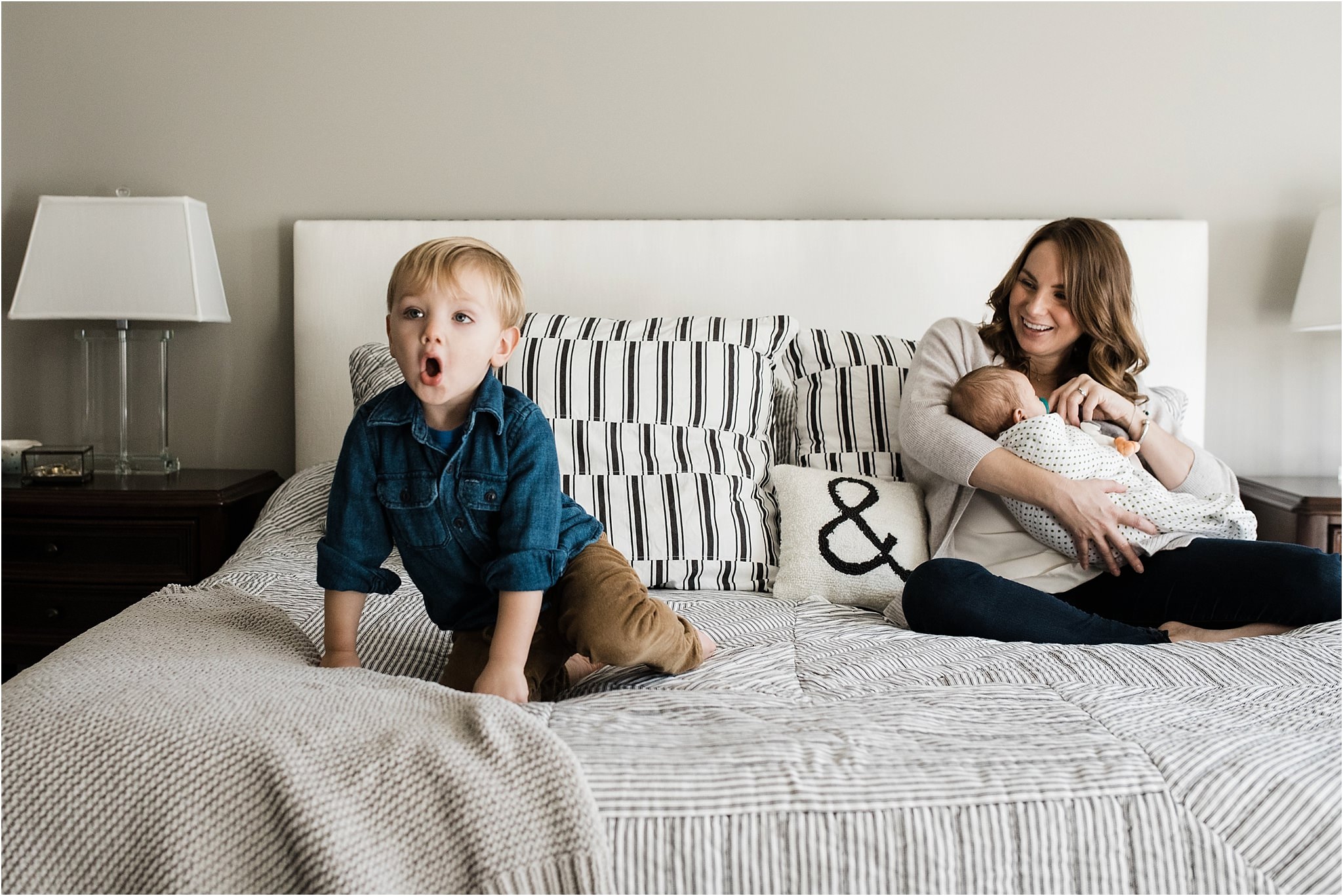 toddler having fun at home newborn session