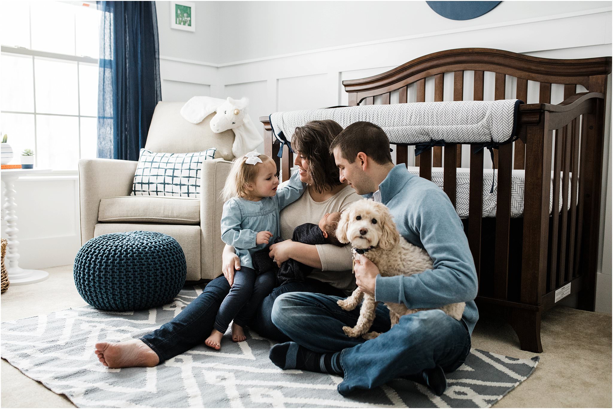 family photos in newborn nursery