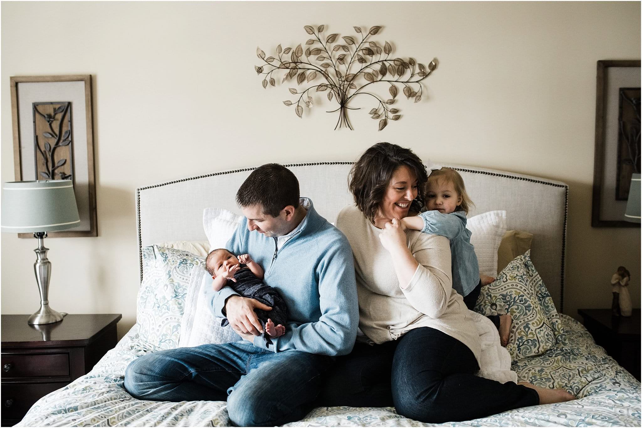 natural family photos during newborn session at home