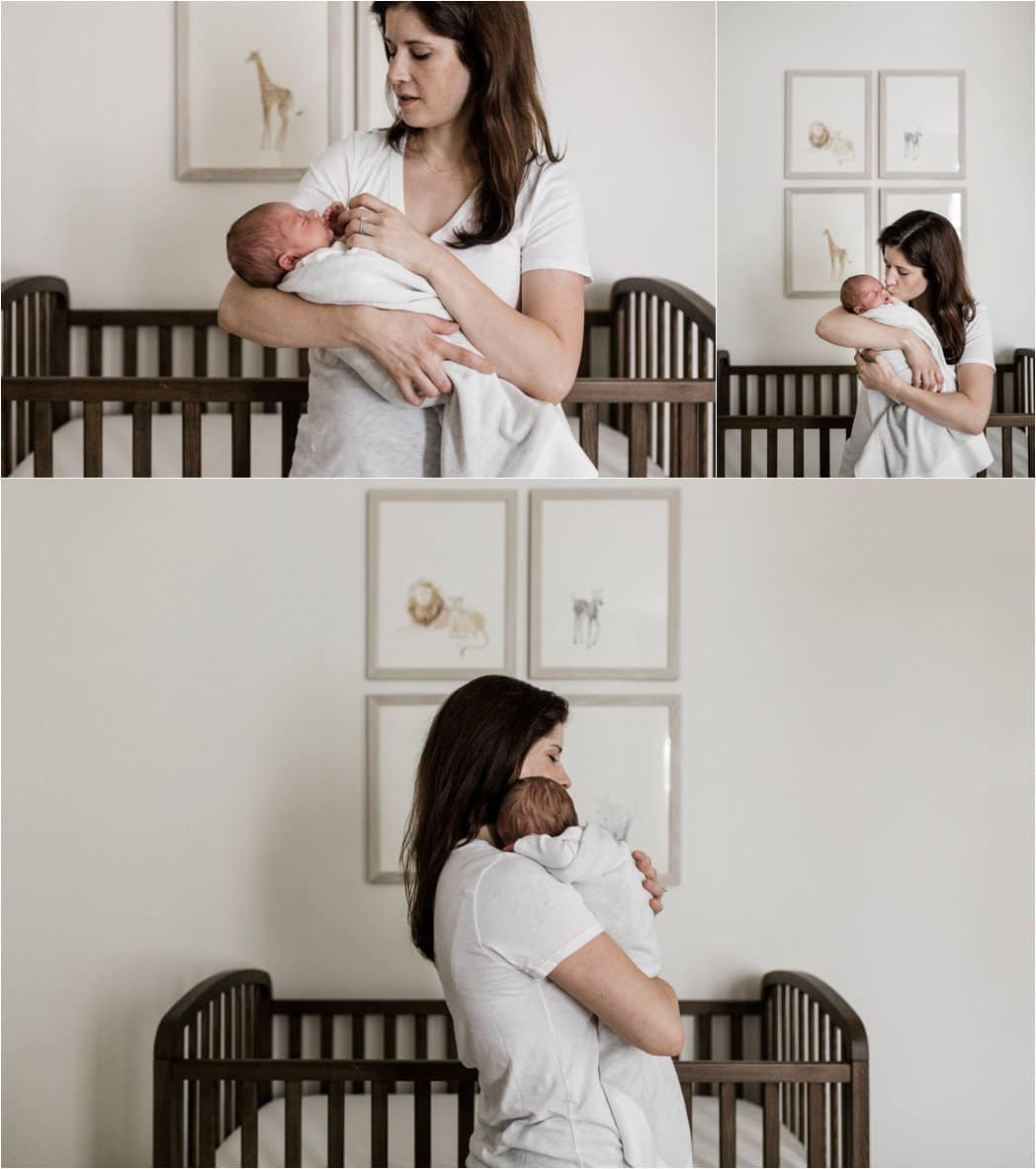 mother holding newborn in neutral nursery