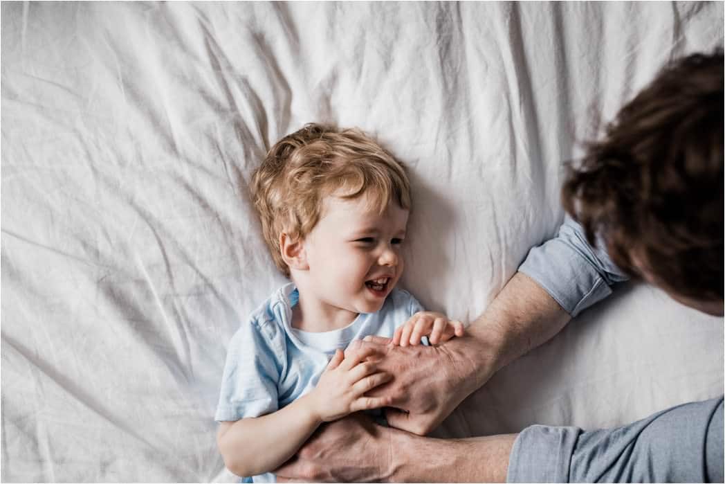 playful photo of big brother at newborn session