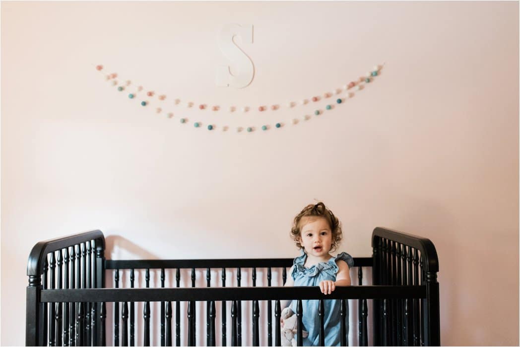 toddler in crib