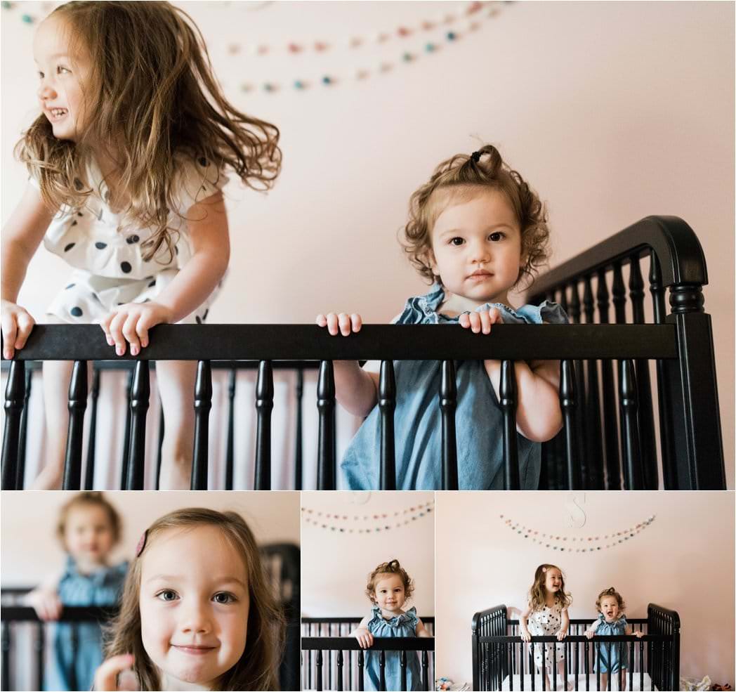 sisters being playful in crib 