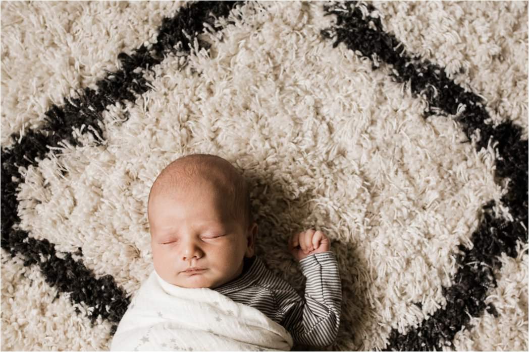 natural swaddled image of newborn baby boy