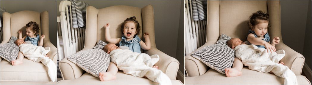 big sister warming up to newborn brother at family newborn session