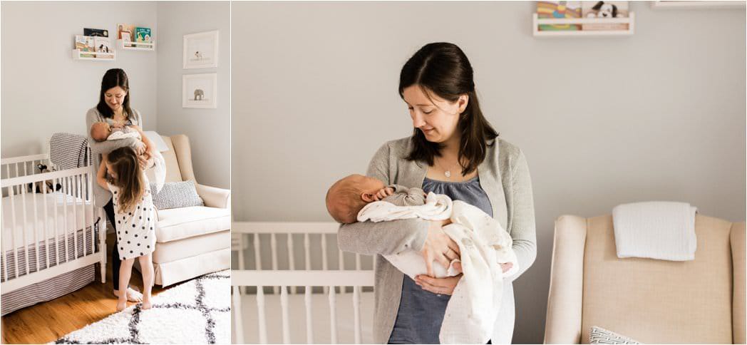 a mother hooding her newborn in the nursery