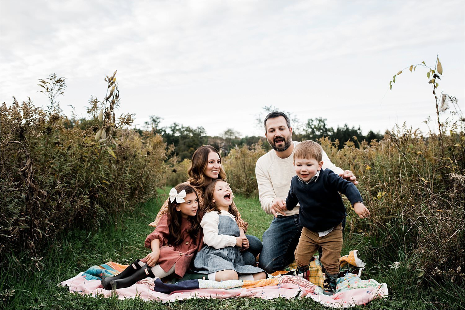 lifestyle family photo in open field