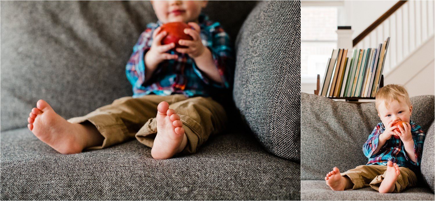 portrait of toddler eating an apple