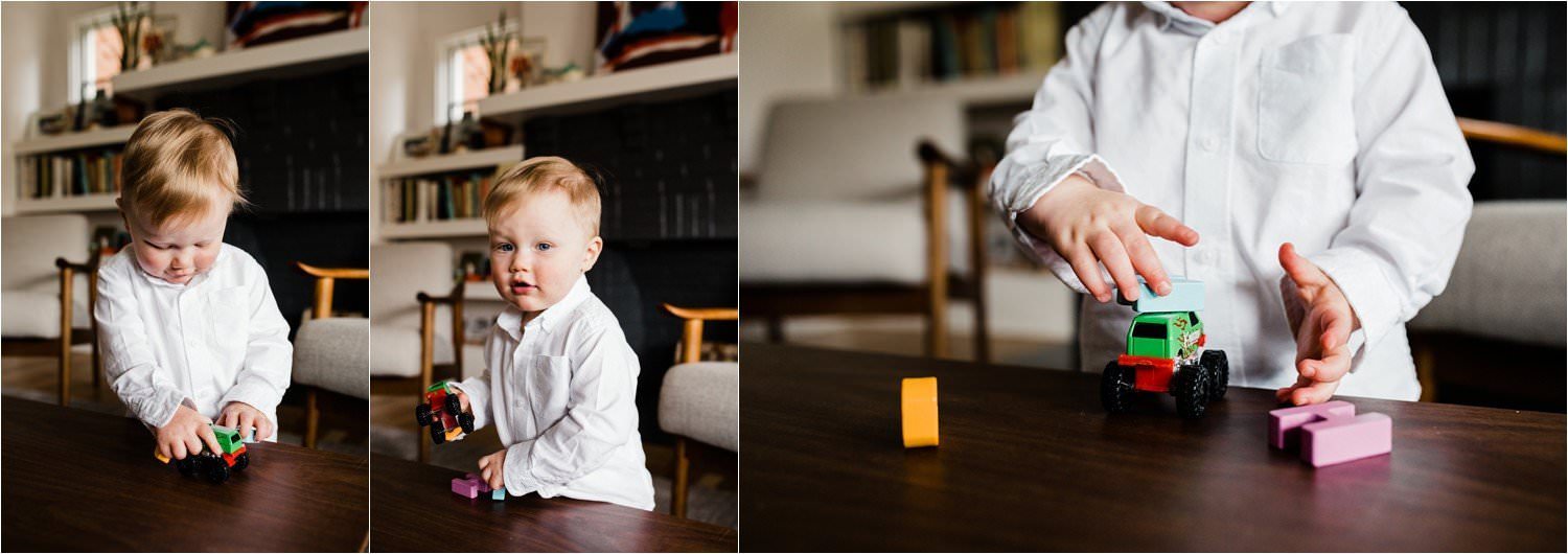 toddler playing during family photos at home