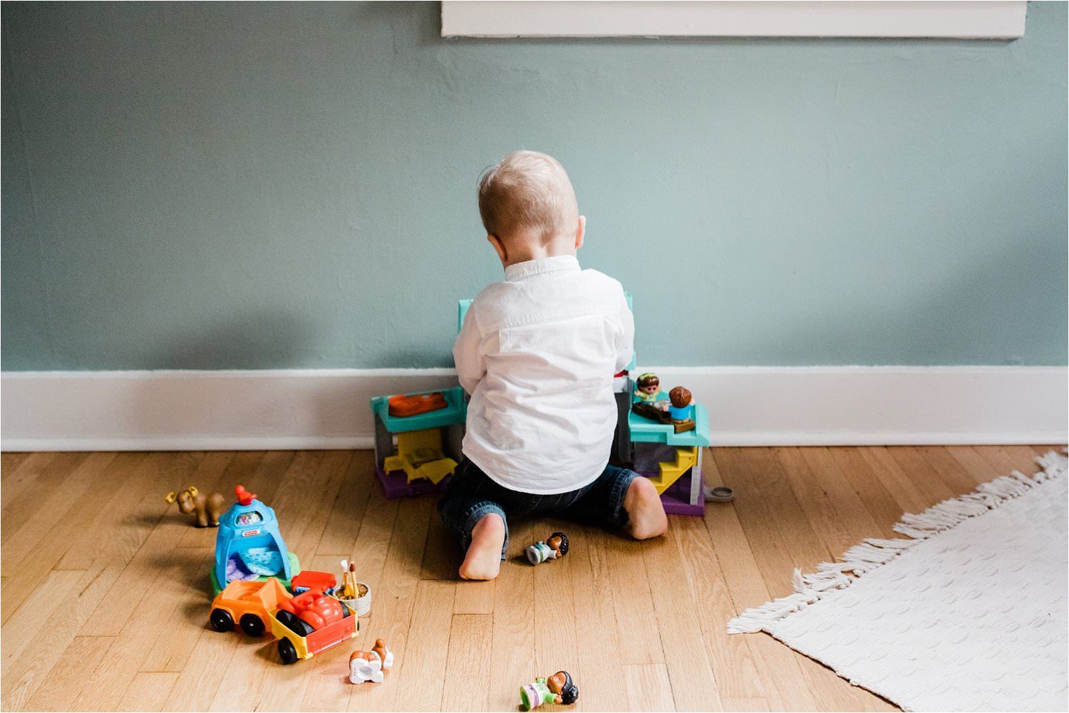 child playing in room during Family photos at home