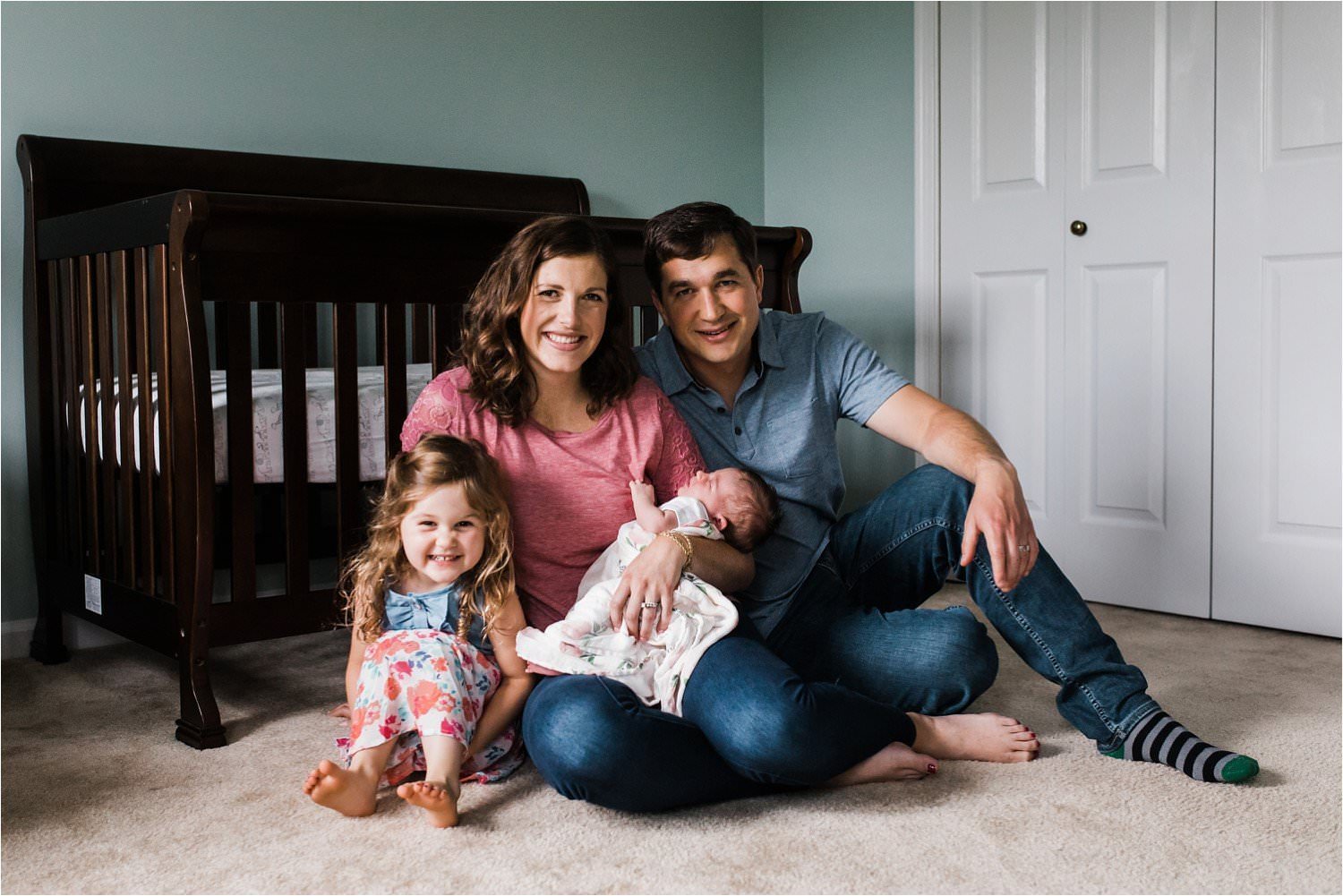 casual family photos at home with newborn
