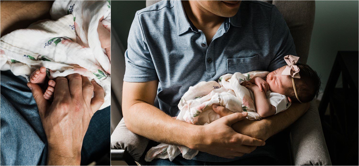 father holding newborn baby toes and swaddled baby