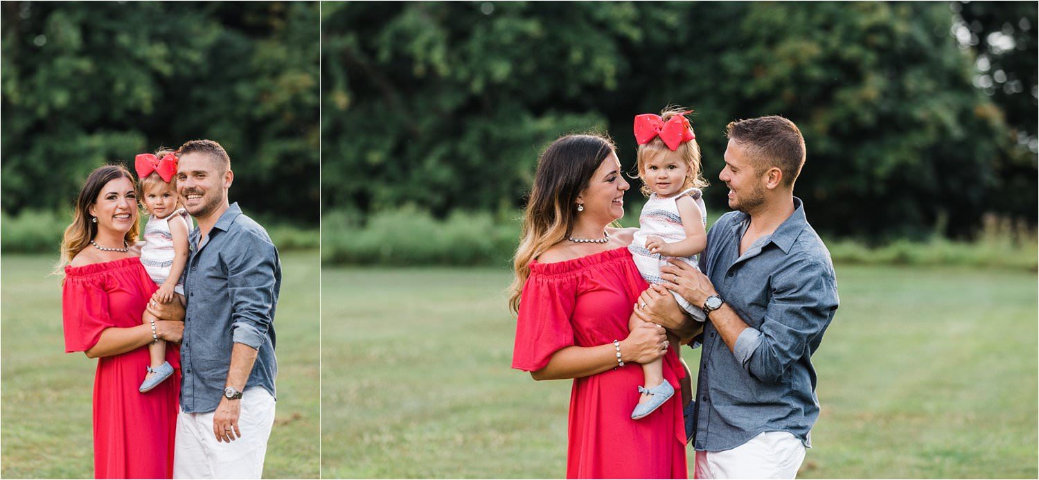 toddler girl with parents during sumer photo session