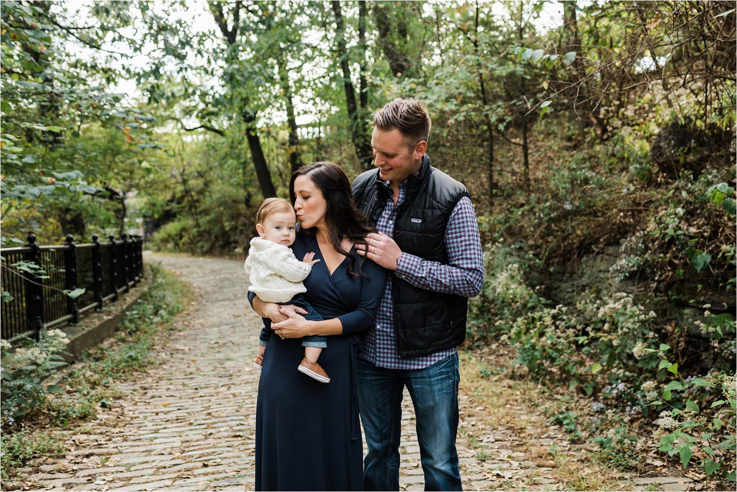 Parents holding 6 month old baby