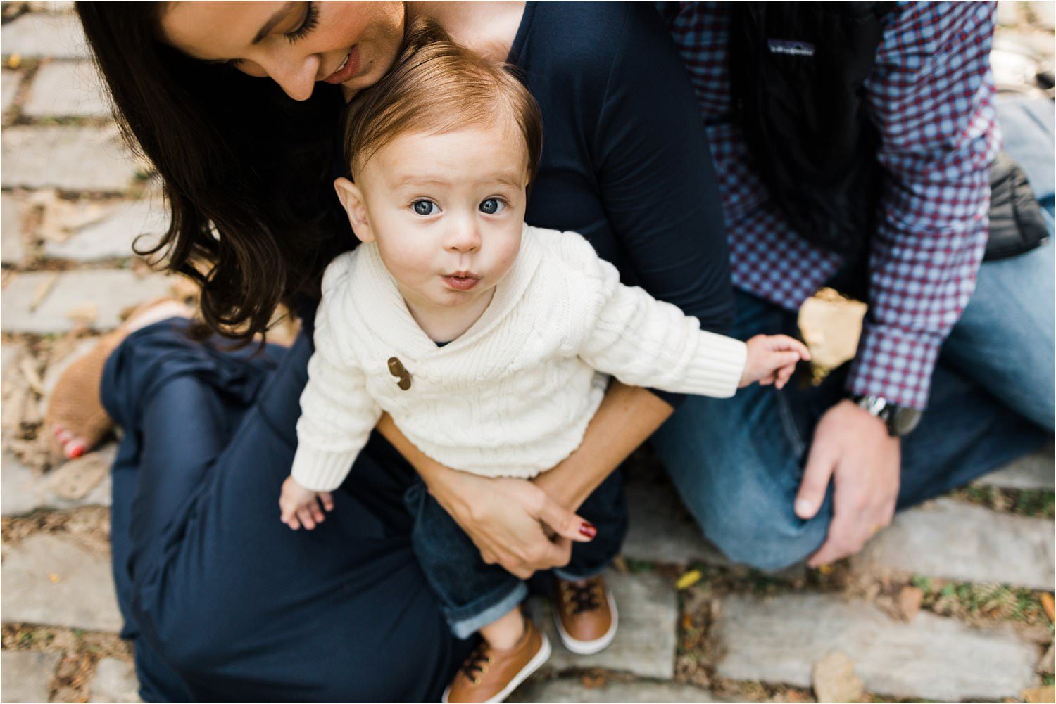 baby sitting in parents laps