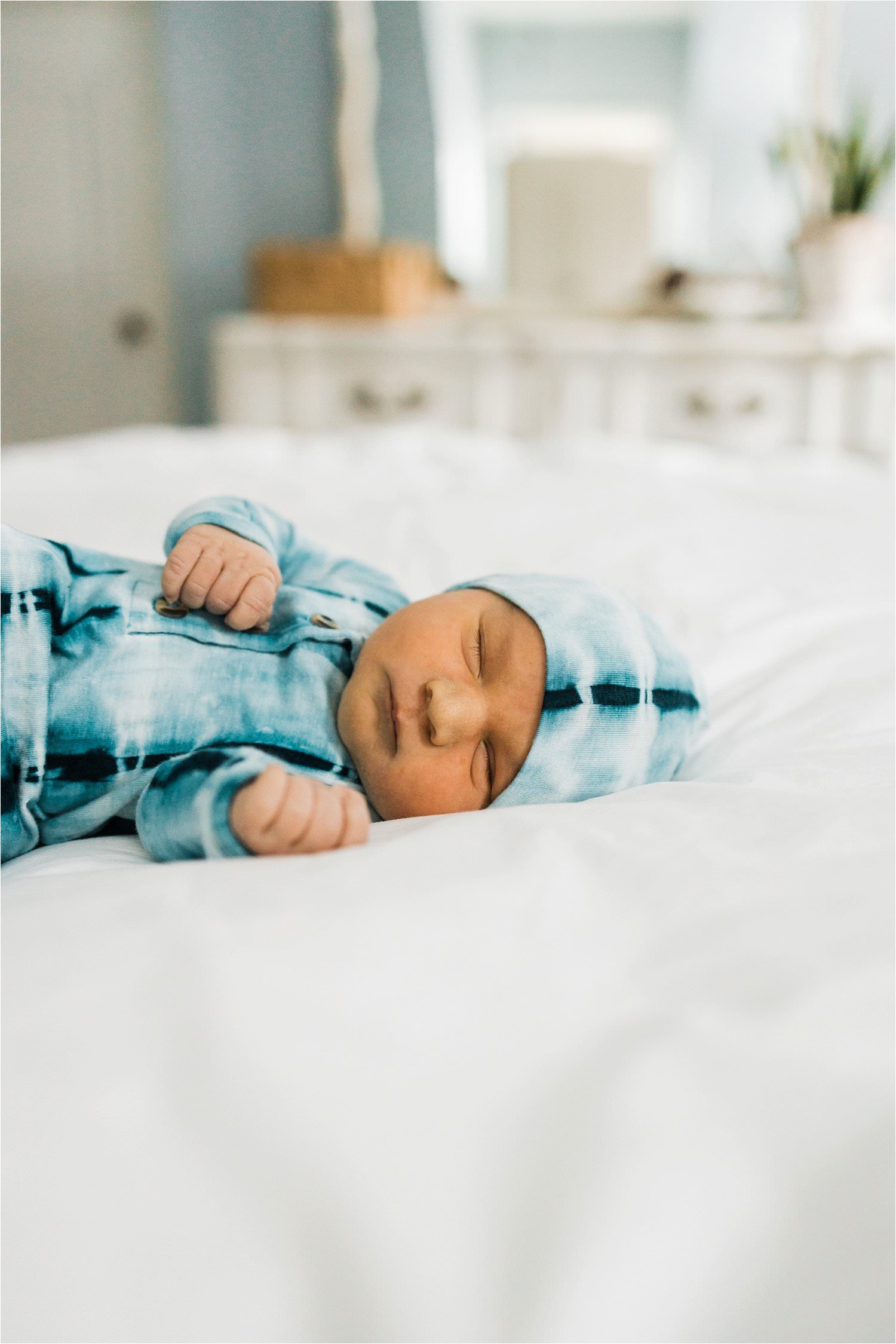 NEWBORN BABY BOY IN SLEEPER AND HAT