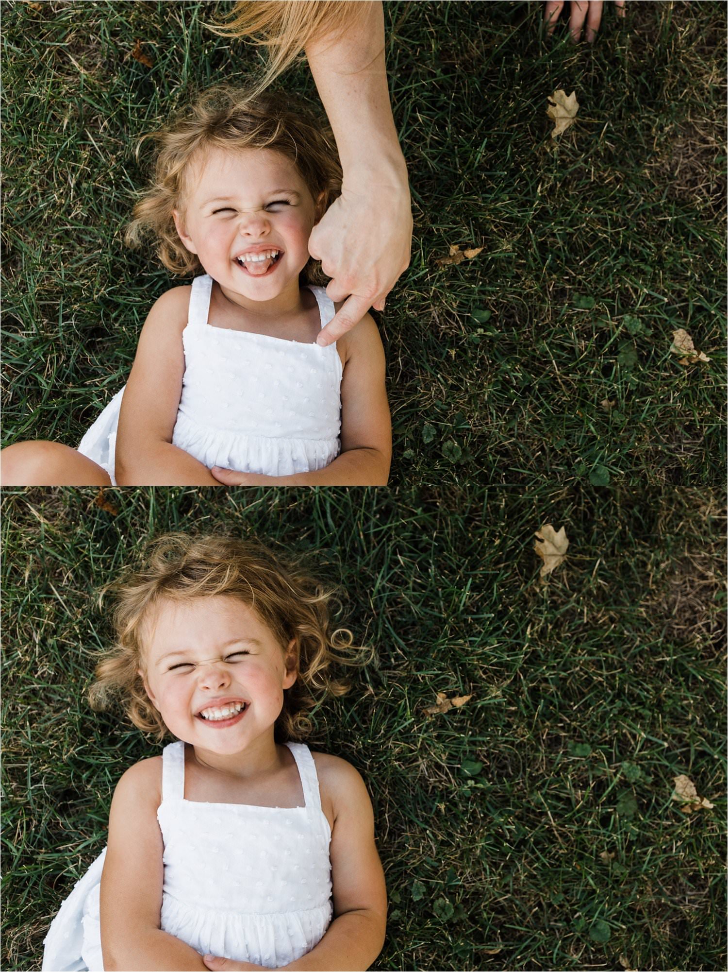 child laughing in the grass